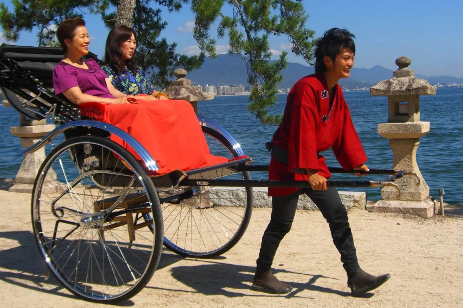 Sightseeing rickshaw experience in Miyajima, available with a passport