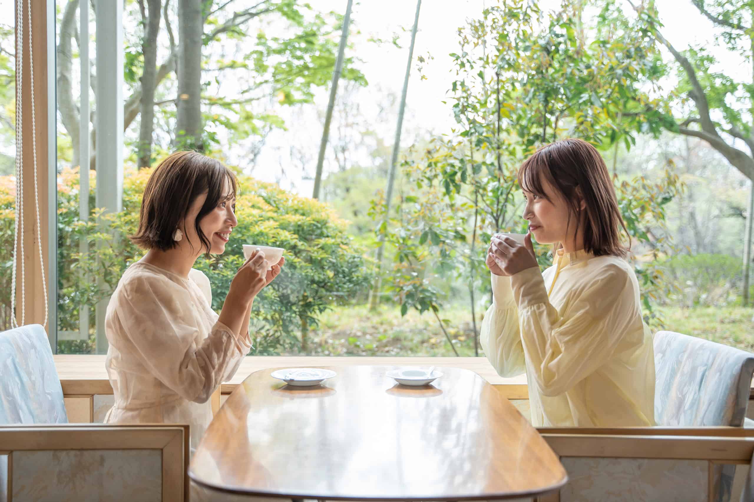 Two women chatting at the lobby