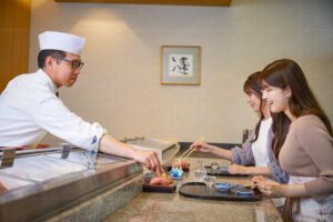 Sushi served at the counter.