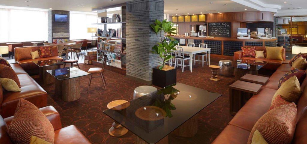 This image has an empty alt attribute; its file name is Business-Lounge-sofa-zone-1-1024x480.jpg