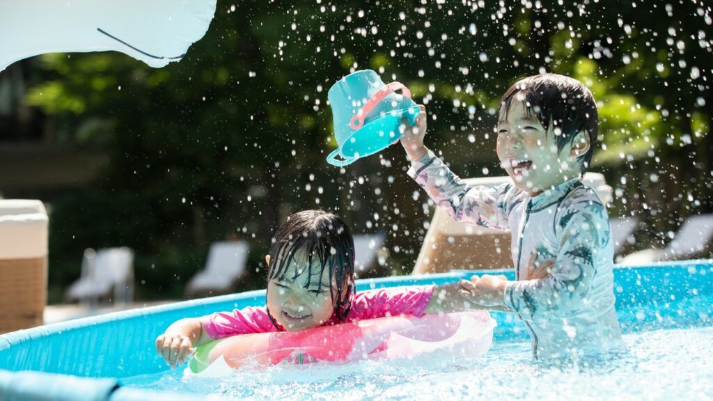 children playing in the pool 