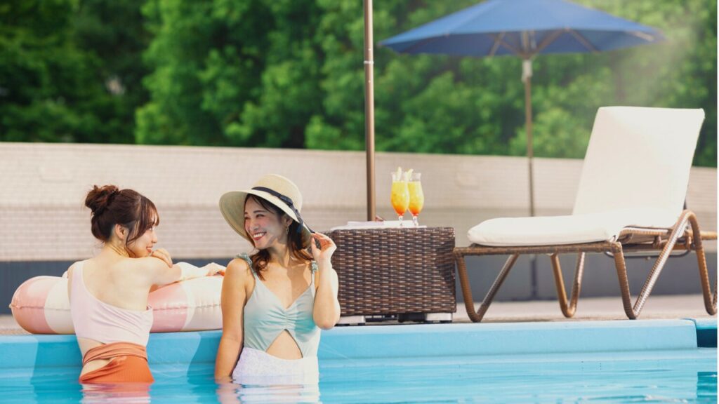 friends enjoy relaxing summer time in the pool 
